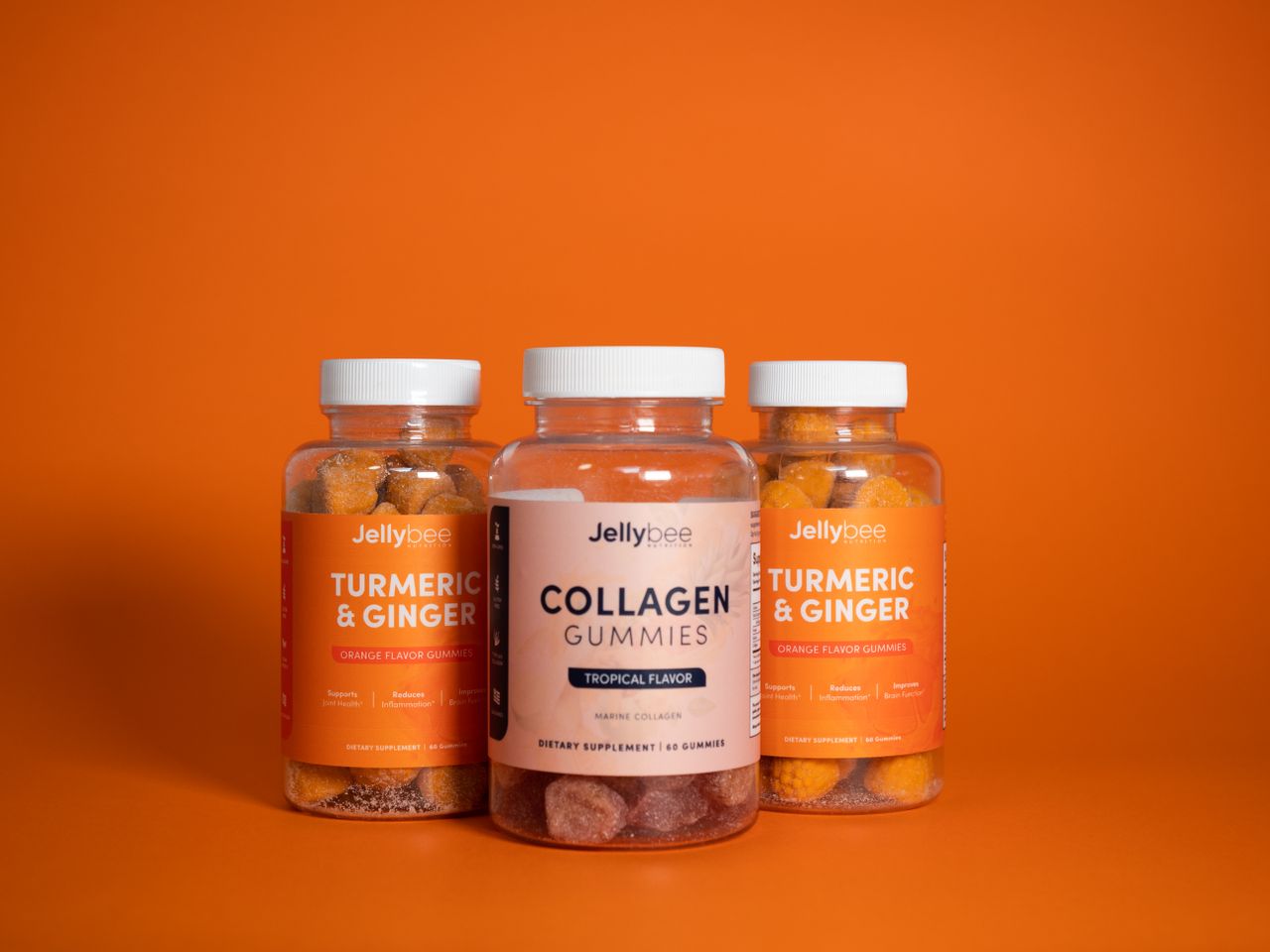 Colorful gummies with turmeric and collagen supplements in product shot.